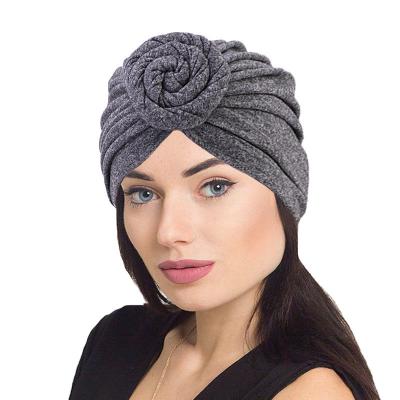 China Solid Flower Knot Ruffle Cotton Fashion Design Girls Donut Turban Cotton Hat Head Roll In Front for sale