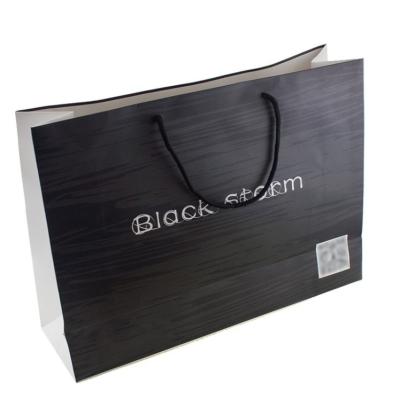 China High Quality Recycled Materials Customized Design Recycled Logo Printing Skin Care Cosmetic Paper Packaging Bag for sale