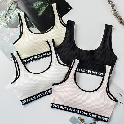 Cina Customize Logo Cotton Young Girl Seamless Bra One Piece Solid Color Sports Wireless School Girls Bra with Cheap Price in vendita