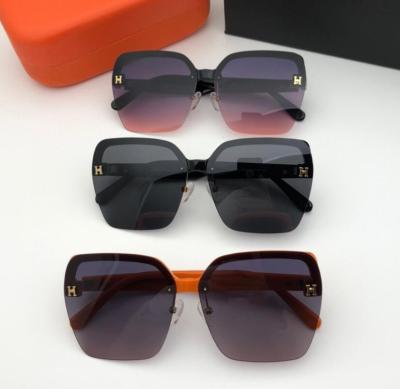 China Anti Fashion UV400 H Letter Polarized Sunglasses Pony Sunglasses Men and Women Color-changing Frameless Sunglasses for sale