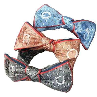 China Popular Designer Bowknot Letter Print 3 Colors Crossed Wide Side Non-slip Bowknot Hair Band Headband Bandana Women Hair Accessories for sale