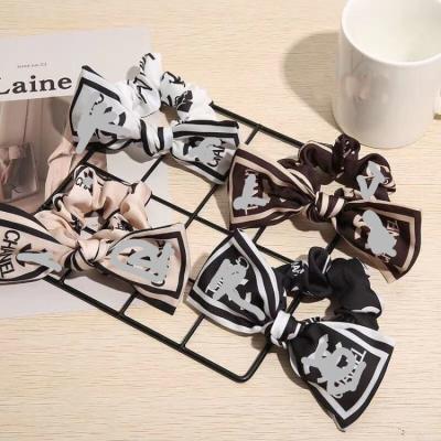 China Popular Scrunchies Hairbands Elastic Bands Letter Print Bowknot Large Intestine Ties Ropes Girls Ponytail Holder Hair Jewelry Accessories for sale