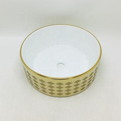 China Modern Bathroom Basin Sink Hole Table Top Shiny Colored Wash Gold Shiny Single Basin Wholesale for sale