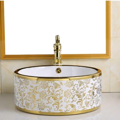 China Modern Art Basin Bathroom Hand Wash Basin Gold Plating Ceramic Sanitary Sink for sale