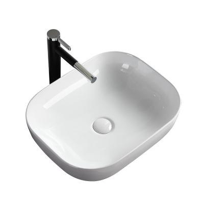 China Modern White Over Counter Oval Ceramic Wash Hand Basins Bathroom Sinks for sale