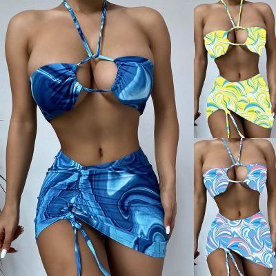 China High Quality Sexy Women Antibacterial Three Piece Halter Strap Print Cavity Padded Push Up Thong Bikini Set Swimwear Beach Wear With Skirt for sale