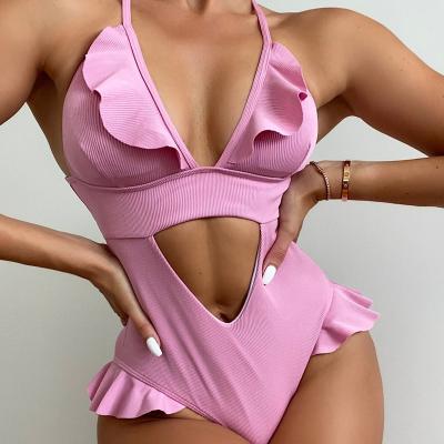 China Designer Logo Wholesale Women Sexy Pink Antibacterial One Piece Hollow Out Backless Bikinis And Triangle Swimwear Swimwear Beach Wear for sale