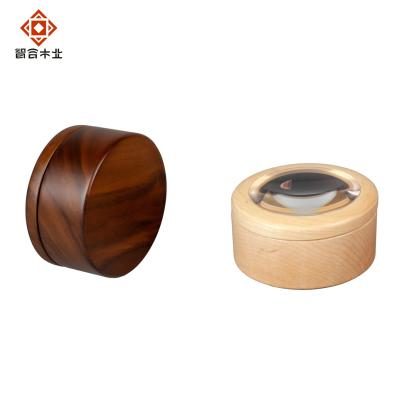 China Recyclable Luxury Rotating Lid Design Around Walnut Solid Wood Jewelry Box Custom Logo for sale