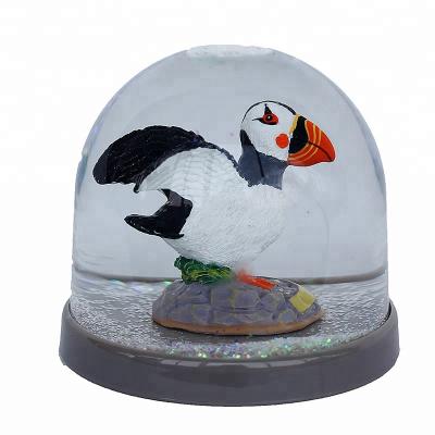 China China Funny Bird Puffin Plastic Snow Globe For Home Decoration Unbreakable Wonderful Snowball Gifts For Kids for sale