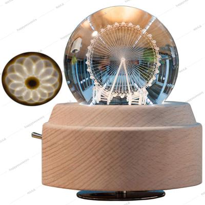 China Custom Round Crystal+wood Musical Box Ball With LED Light And Wind Wooden Music Box for sale