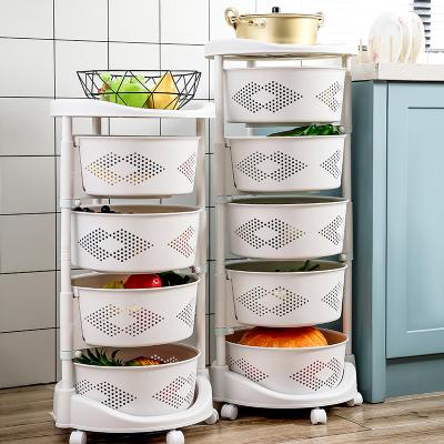 China Modern Kitchen Rotating Shelf 360 Degree Baskets Fruit Vegetable Storage Rack Floor Around Household Multifunctional Shelf With Wheels for sale