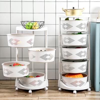 China Modern Kitchen Rotating Shelf 360 Degree Baskets Fruit Vegetable Storage Rack Floor Around Household Multifunctional Shelf With Wheels for sale