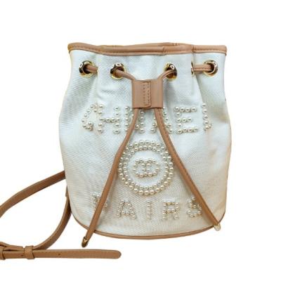 China Casual Shoulder Canvas Material Tote Fashion Large Capacity Adjustable Bucket Bag With Beading Letter for sale