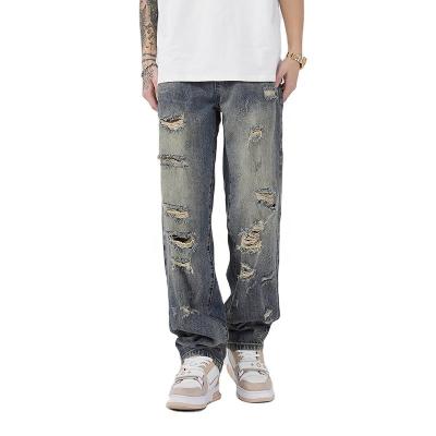 China Fashionable hip-hop style breathable men's designer high quality loose popular brand denim hole style street style 100% cotton straight leg jeans for sale