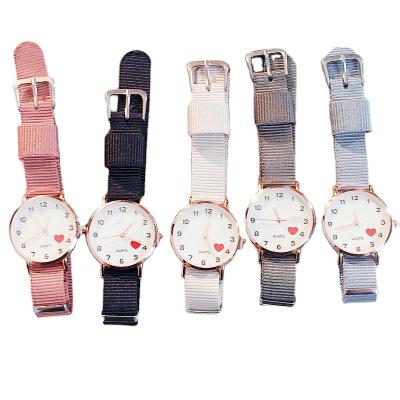 China Cute fashion quartz watch girl simple and soft heart date canvas strap automatic watch female student for sale