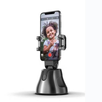 China ABS Rotating Mobile Phone Holder Face Tracking Selfie To Live Smart Phone Holder for sale