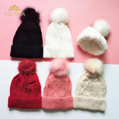 China breathable & Thick Knitted Women's Skullies Beanies Hat Pom Poms Hat Women Girl Feminine Fur Winter Waterproof Solid Color Knitted Beanies for sale