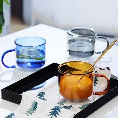 China 250ml Sustainable Green Blue Pink Brown Double Wall Borosilicate Glass Double Wall Mug With Handle For Coffee, Milk, Juice, Ice Water for sale