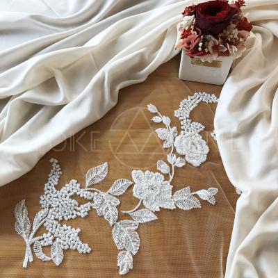 China Sustainable Embroidered Knitting Luxury Elasticity Ivory Tulle Lace Up Fabric F20060mn for sale