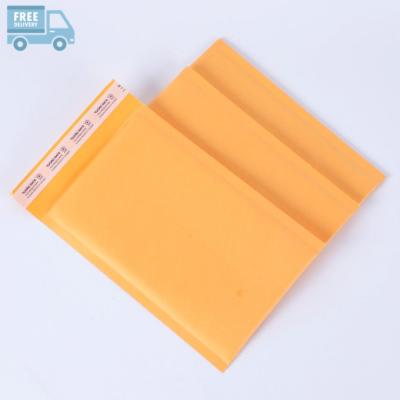 China Shock Resistance US Stock Padded Kraft Paper Bubble Mailer Mailer For Transparent Cloth Mailing for sale