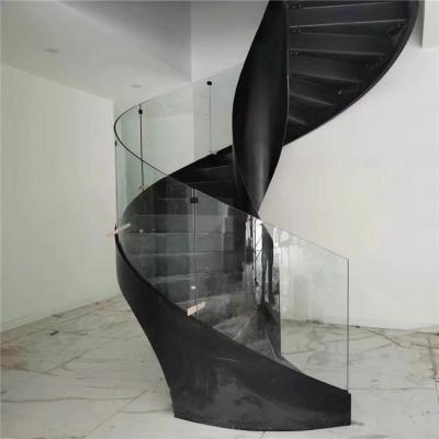 China Modern Carbon Steel Black Curved Spiral Staircase With Powder Coated Finish for sale