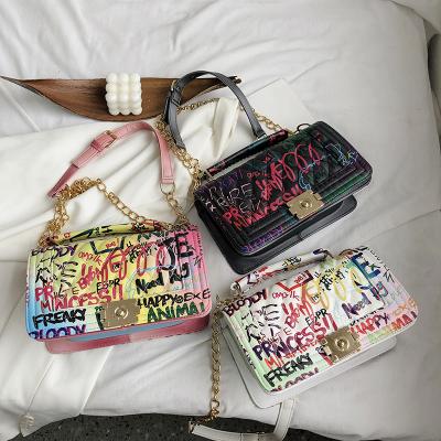 China 2022 Wholesale Multifunctional Trendy Designer Handbags Casual Graffiti Printed Chain Purses Sling Bags Graffiti Handbags for sale