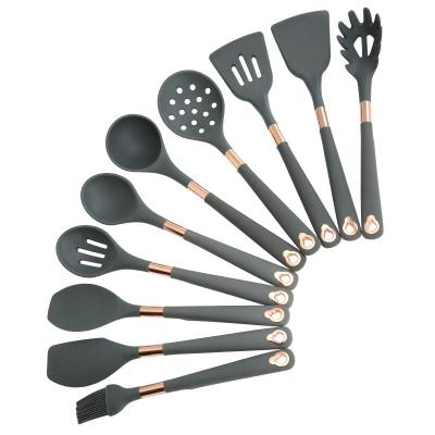 China Sustainable New Design 10 Pieces Stainless Steel Handle Cookware Silicone Utensils Set With Cube Storage Bracket for sale