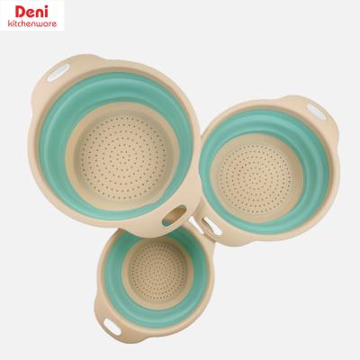 China Hot Sustainable Rotated Kitchen Folding Filter Basket Telescopic Water Handle Wash Vegetables Fruit Silicone Cookware for sale