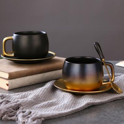 China Viable Nordic Ceramic Cup 280ml Gold Porcelain Coffee Cup And Saucer Creative Frosted Black Set for sale