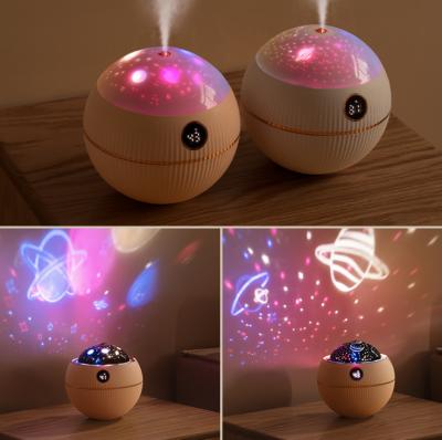 China Fashion Mini Bedside Atmosphere Lamp USB Starry Projector Humidifier for sale