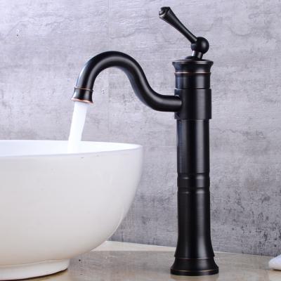 China Modern Black Basin Faucet Single Handle Bathroom Sink Mixer Deck Mounted Hot And Cold Water Sink Faucet for sale