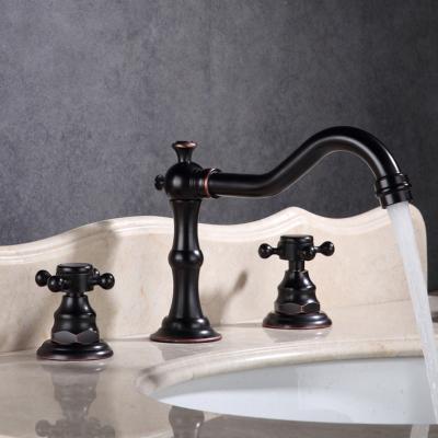 China Modern Black Basin Faucet Single Handle Bathroom Sink Mixer Deck Mounted Hot And Cold Water Sink Faucet for sale