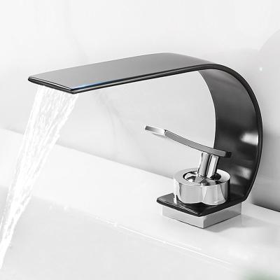 China Modern Single Handle Basin Vanity Sink Faucet Waterfall Bathroom Mixer Deck Mounted Hot And Cold Water Sink Faucet for sale