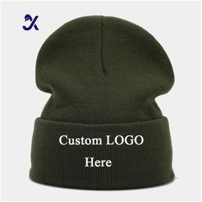 China COMMON JX  Custom Woven Label Logo Solid Color Warm Cap Winter Acrylic Knitted Cuffed Beanie Knit Hat Caps for sale