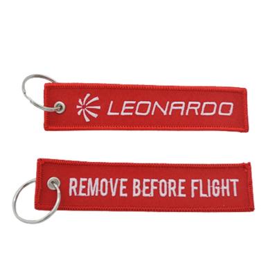 China Polyester Custom Stylish Embroidery Key Holder With Remove Before Flight for sale