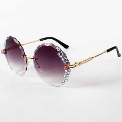 China Fashion Sunglasses Women Color Luxury Irregular Round Diamond Rimmed Rimless Trimmed Sunglasses Fashion Diamond Inlaid Trend Glasses Personalized for sale