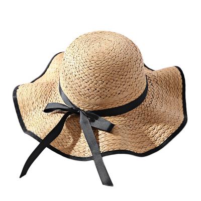 China Wholesale Multicolor Bucket Panama Straw Hat For Women Summer Character Bowknot Ruffle Brim Design for sale