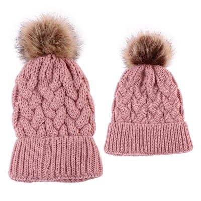 China JOINT Wholesale Family Matching Mommy and Me Ski Cap Son Knitted Cable Hat Mother Baby Daughter Beanie With Faux Fur Pompom for sale