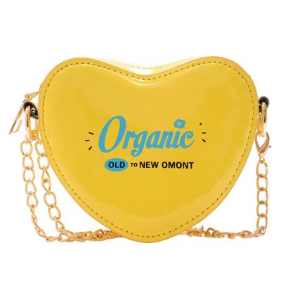 China Xiangfeng Little Children's Girl's Chain Fashion Cute Heart-shaped Wallet Pu Mini Baby Kids Bag for sale