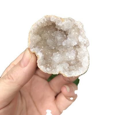 China Wholesale Natural Raw Crystal Group Hole Geode China Healing White Quartz Agate Geode for sale