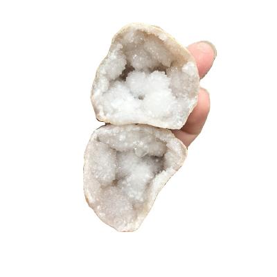 China Wholesale Natural Raw Crystal Group Hole Geode China Healing White Quartz Agate Geode for sale