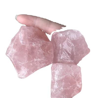 China China Raw Natural Rose Quartz Mineral Quartz Rough Stone Rose Crystals Healing Pink Stones for sale