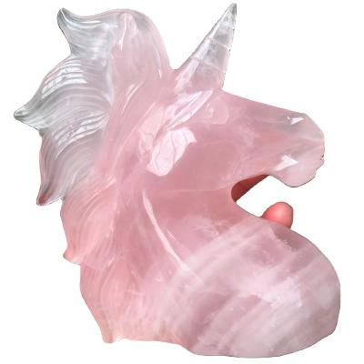 China China Natural Pink Quartz Crystal Hand Carved Crafts Unicorn Horse Head Statues Rose Quartz Unicorn for sale