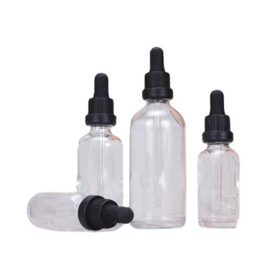 China Personal Care 4oz Clear Boston Round Transparent Mist Bottle With Black Glass Dropper for sale