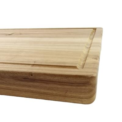 China Sustainable Acacia Wood Cutting Board With Squeezer Groove Wooden Cutting Board Durable And Solid Wooden Cutting Board for sale