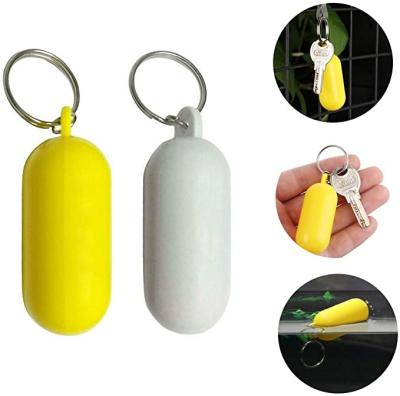 China Wholesale Cheap Popular 2022 Modes Inside Shape Empty Plastic 3D Tag Floating Capsule Key Chain With Custom Logo for sale