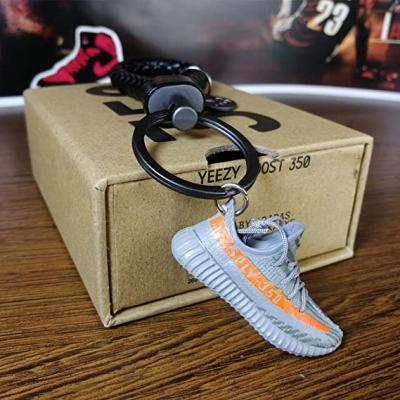 China 2022 New Arrival Popular Yeezy Key Chains Promotional Shoe Keychains Mini Sneaker Wholesale PVC 3D Sublimation Gifts for sale