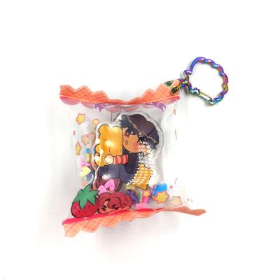 China Custom Shaker Charm Acrylic Inflatable Candy Food Bag Candy Gift Printing Key Chain for sale