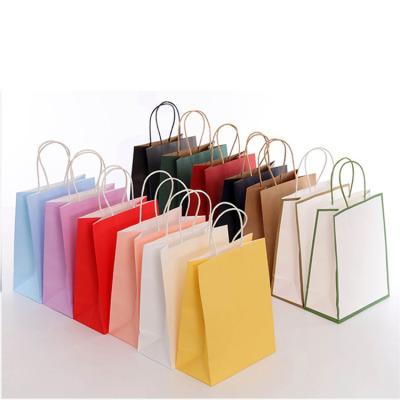 China Recycled materials color kraft paper bag milk tea baking catering bag clothing gift packaging bag advertising handbag for sale