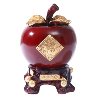 China Custom Gift Chinese Style US Dollar Money Saving Jar Resin Apple Piggy Bank Coin Savings Parents Money Jar Change Gift for Kids Children for sale